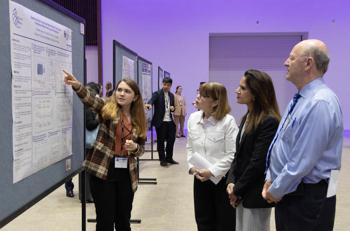 Brown, Shah and Daugherty toured posters in the Central Bank Center showcasing a variety of cardiovascular research from UK students.