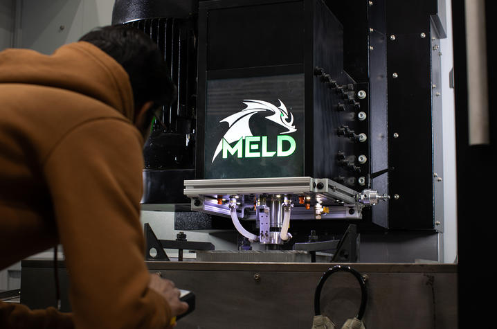engineering student working in a fabrication lab