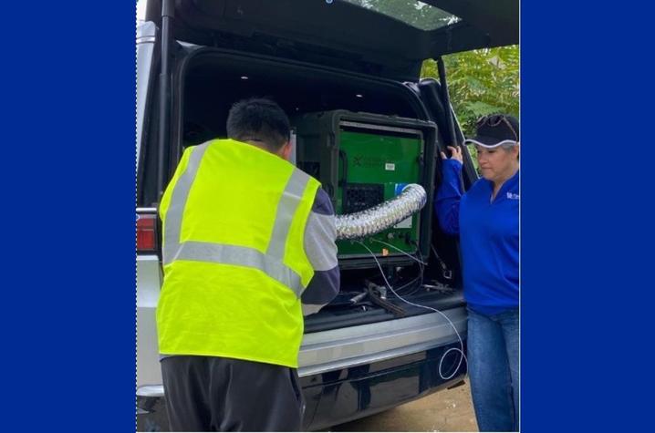 UK Civil Engineering graduate student Herman Tay, left, and Kelly Pennell, Ph.D., at a field site with AROMA-VOC