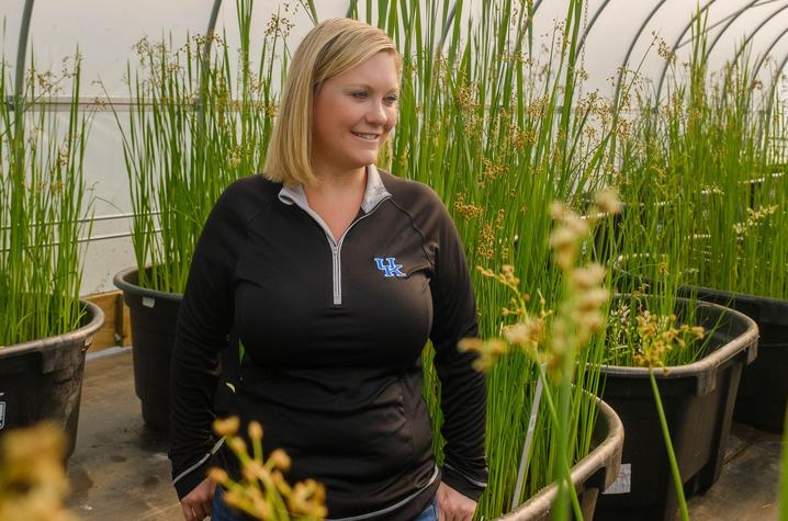 Tiffany Messer in a greenhouse