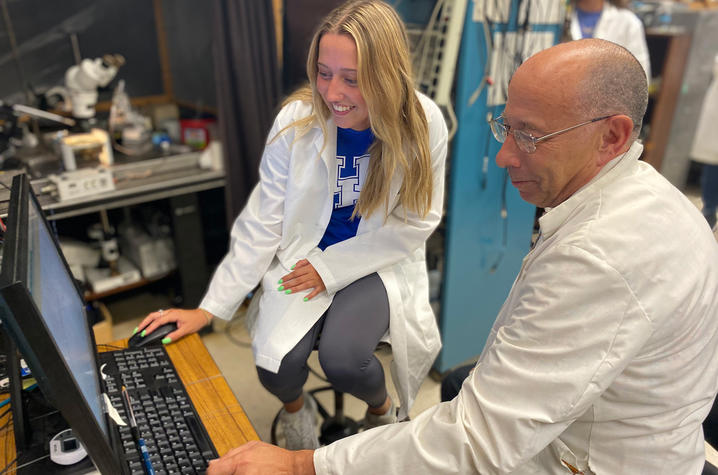 UK student Kaitlyn Brock, left, and Professor Robin Cooper work together in a research lab.