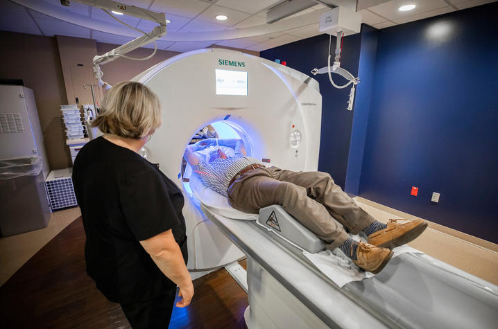 A patient going into a CT scanner