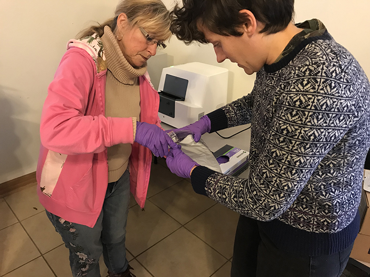 Nina McCoy, left, and Ricki Draper, process water samples at the Martin County Extension office