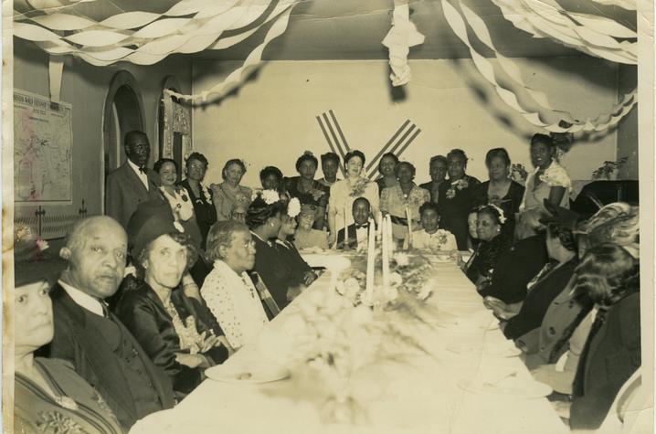 a scan of a photograph of civil rights leaders at a table