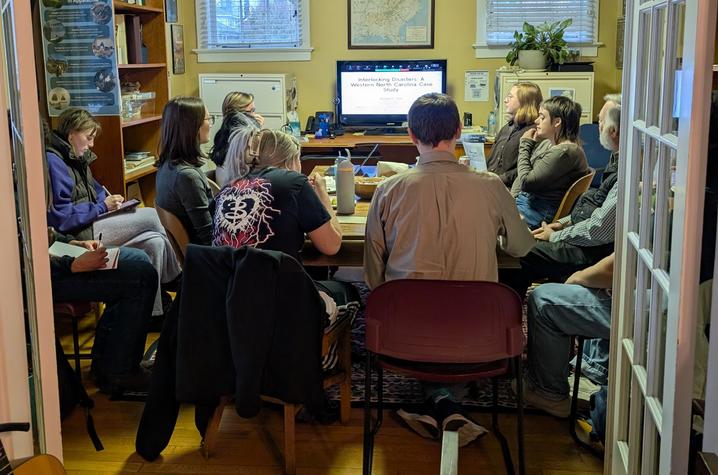 students gathered around a table at the UK Appalachian Center
