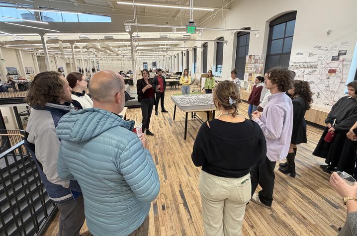 people gather in an open design studio