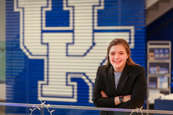 Lauren Roehr in front of a large UK logo
