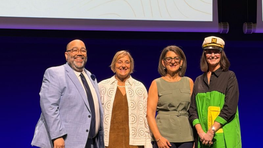 Group photo of Dr. Moga on stage with ISPE leadership