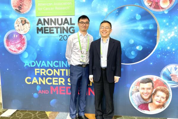 Jinghui Liu and Xiaoqi Liu at the 2023 AACR conference