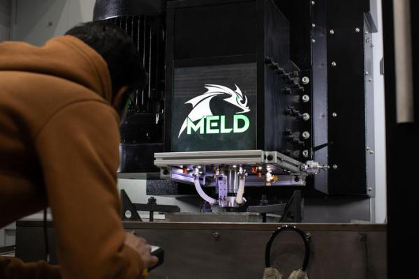 engineering student working in a fabrication lab