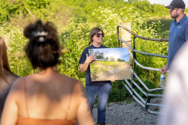 Robin Ridge Farms owners, Ben and Savannah Robin, leading the water conservation walking tours.