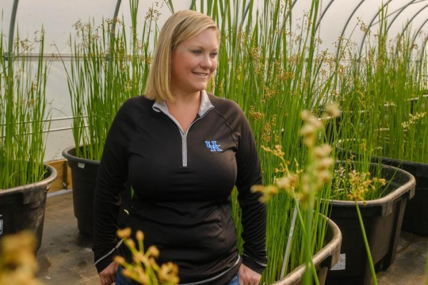Tiffany Messer in a greenhouse