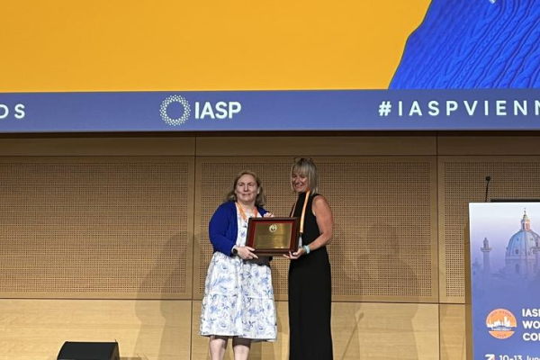 Julie Cerel accepts an award