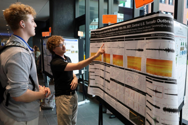 Seth Thompson presenting a poster at the 2025 Sustainability Showcase