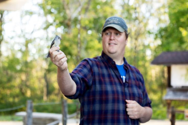 Darin “DJ” McNeil holding a bird