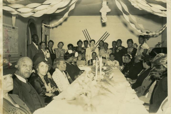 a scan of a photograph of civil rights leaders at a table