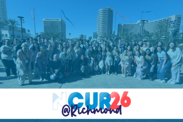 A group of students gathered outdoors - NCUR26 @Richmond logo under