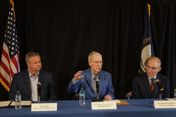 Eric Frankl, Mitch McConnell and Eli Capilouto sit at a panel table