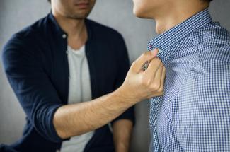 stock photo: man grabbing another's collar