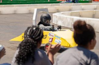 Kentucky 5th grader driving a one-person electric vehicle