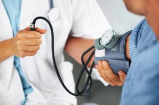 Photo of blood pressure being taken