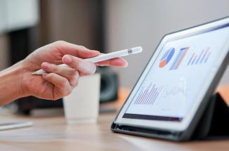 Stock image of a tablet showing charts