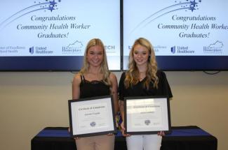 Jazmen Fugate and Jayla Ledford of Perry County receive certificates for completing the Kentucky Homeplace Apprenticeship.