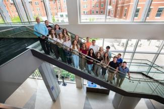 The 2021 ACTION Summer Program participants with program director Nathan Vanderford (far left) and program coordinator Chris Prichard (far right).