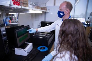 Mark Ebbert and his research assistant on Aug. 5, 2021. Pete Comparoni | UK Photo