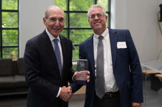 UK President Eli Capilouto presenting University Research Professor award to Ron Zimmer, Ph.D.