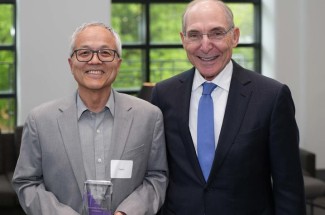 Feng Li, D.V.M., Ph.D., pictured with UK President Eli Capilouto after receiving his 2023-24 University Research Professor award.