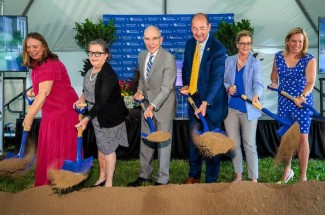 The new Agricultural Research Building will serve as the central research hub at Martin-Gatton CAFE. From left: Suzanne Miles, Nancy Cox, Eli Capilouto, Rocky Adkins, Rebecca McCulley and Amanda Mays Bledsoe. Photo by Matt Barton.