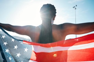 runner with an American flag