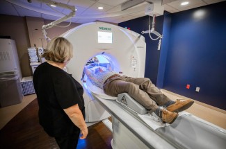 Patient laying in a CT Scanner