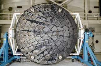 After NASA’s Orion spacecraft was recovered at the conclusion of the Artemis I, its heat shield was removed from the crew module and rotated for inspection