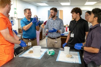 Students from Rochester School for the Deaf work alongside faculty mentors in Wilmot Cancer Institute’s Future Deaf Scientists program