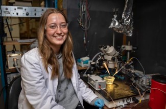 Kaitlyn Brock studies the skeletal muscle of test crayfish in the lab