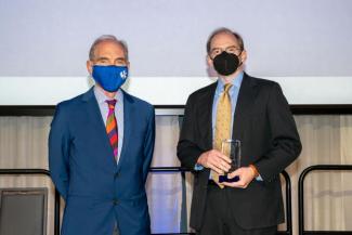 President Eli Capilouto and University Research Professor J. Todd Hastings