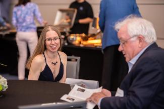Reception emcee Sylvie Garneau-Tsodikova and Simon Sheather.