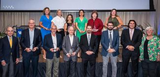 From left, top row: Susan Chambers Cantrell, Lindsey Fay, Nancy Schoenberg, Yuha Jung, Judith Page, Carrie Oser. From left, front row: Eli Capilouto, Peter Nelson, Merlin Lindemann, Theodore Schatzki, David Fardo, Alexandre Martin, Bobi Ivanov, and Lisa Cassis.