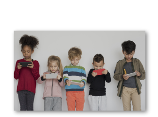 children on a wall holding mobile devices