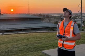Asa O’Neal pilots a drone in Oklahoma.