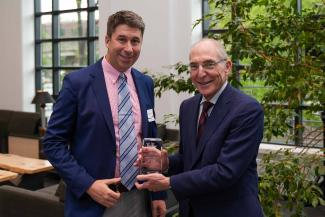 William Gerken accepting the University Research Professor award from UK President Eli Capilouto.