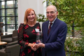 Kimberly A. Parker accepting the University Research Professor award from UK President Eli Capilouto.