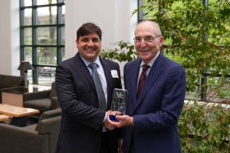 Mauro P. Santamaria accepting the University Research Professor award from UK President Eli Capilouto.