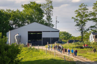 Participants touring the different water conservation sites at Robin Ridge Farms.