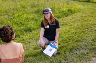 UK extension water quality specialist Amanda Gumbert interacting with an event participant.