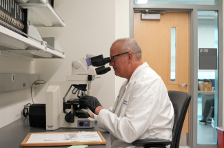 Pete Nelson, M.D., Ph.D., director of neuropathology at the Sanders-Brown Center on Aging