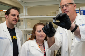 Sanders-Brown researchers Ryan Shahidehpour, Tiffany Lee and Pete Nelson in the new lab space.