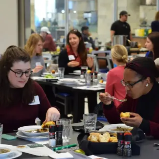 people eating in a dining hall